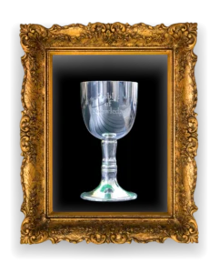 a photo of the goblet of knowledge framed in an ornate gold frame